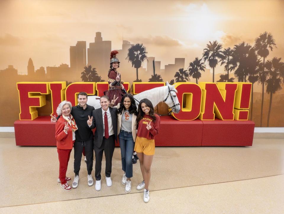 Eric Musselman, center, poses with his family, from left to right: mother Kris, son Michael, wife Danyelle and daughter Mariah.