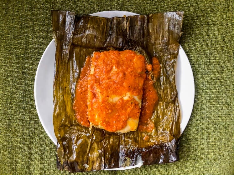 LOS ANGELES, CA.,(April 2, 2020)-Jalapeno and cheese tamal from Mi Ranchito Veracruz, steamed in banana leaf. (Bill Addison/Los Angeles Times)