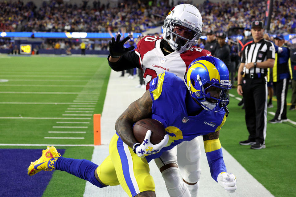 Marco Wilson of the Arizona Cardinals unsuccessfully attempts to stop Odell Beckham Jr. of the Los Angeles Rams from scoring a touchdown. (Photo by Harry How/Getty Images)