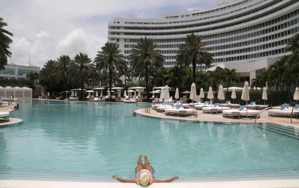 Miami Beach, Florida, June 1, 2020- A hotel guest enjoys having the pool practically to herself at Fontainebleau Miami Beach.