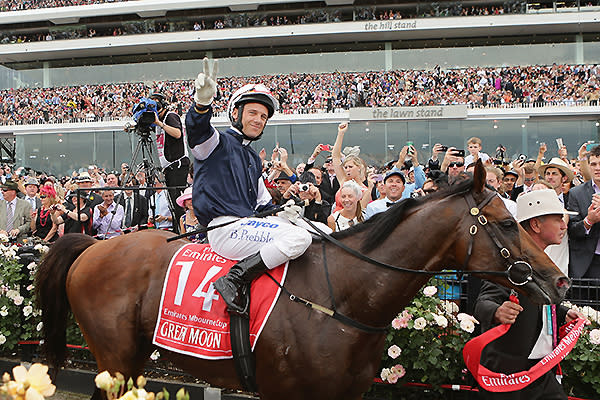 <p>Brett Prebble riding Green Moon celebrates as he returns to the scales after winning the Melbourne Cup.</p>