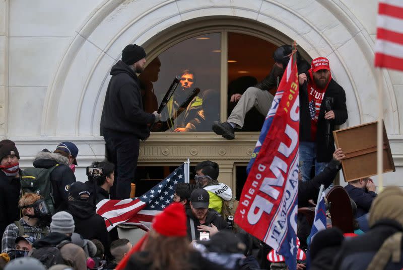 FILE PHOTO: The U.S. Capitol Building is stormed by a pro-Trump mob on January 6, 2021