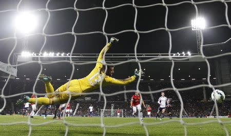 Daley Blind (R) of Manchester United shootspast Boaz Myhill to score against West Bromwich Albion during their English Premier League soccer match at The Hawthorns in West Bromwich October 20, 2014. REUTERS/Stefan Wermuth