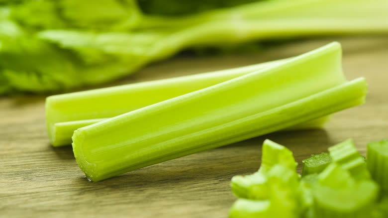 celery sticks on cutting board