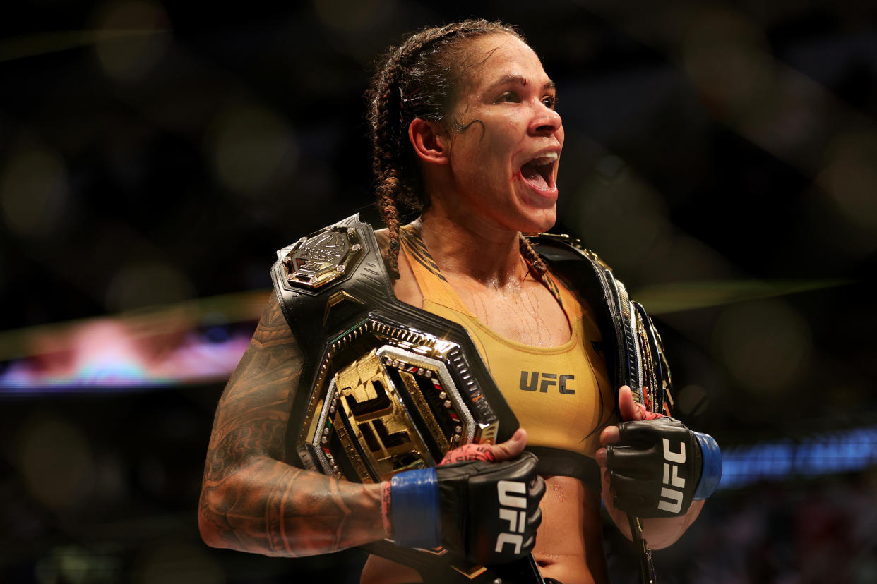 DALLAS, TEXAS - JULY 30: Amanda Nunes of Brazil celebrates after defeating Julianna Pena in their bantamweight title bout during UFC 277 at American Airlines Center on July 30, 2022 in Dallas, Texas. Amanda Nunes won via unanimous decision. (Photo by Carmen Mandato/Getty Images)