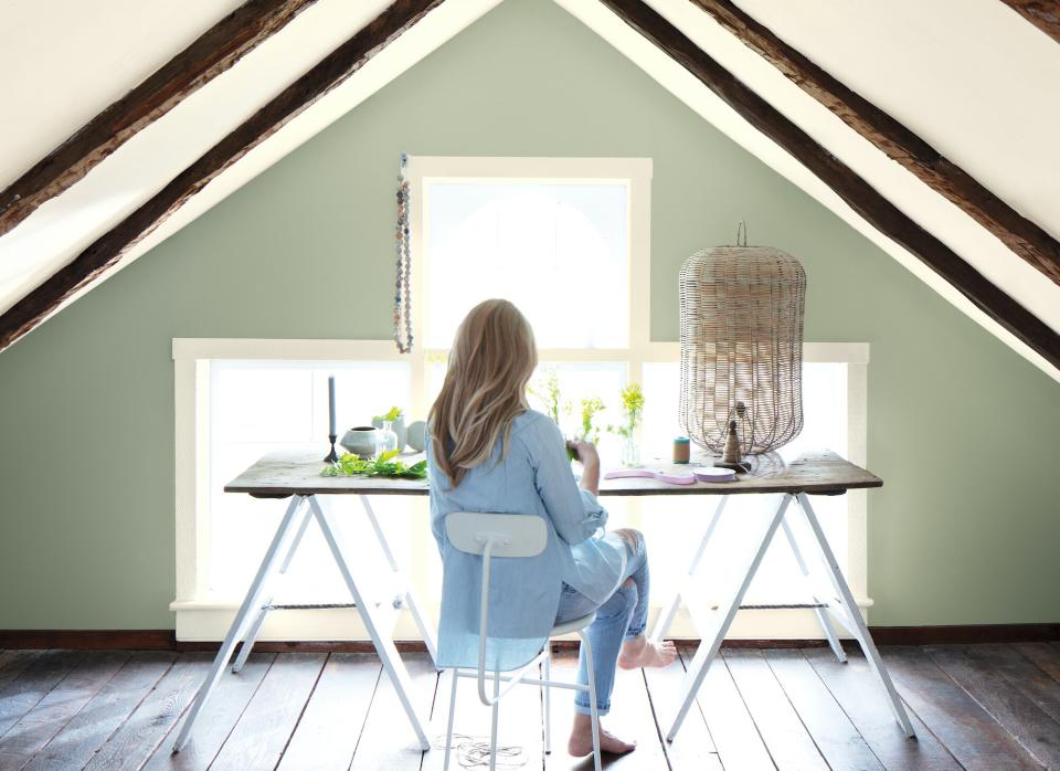 Attic office with sage green walls