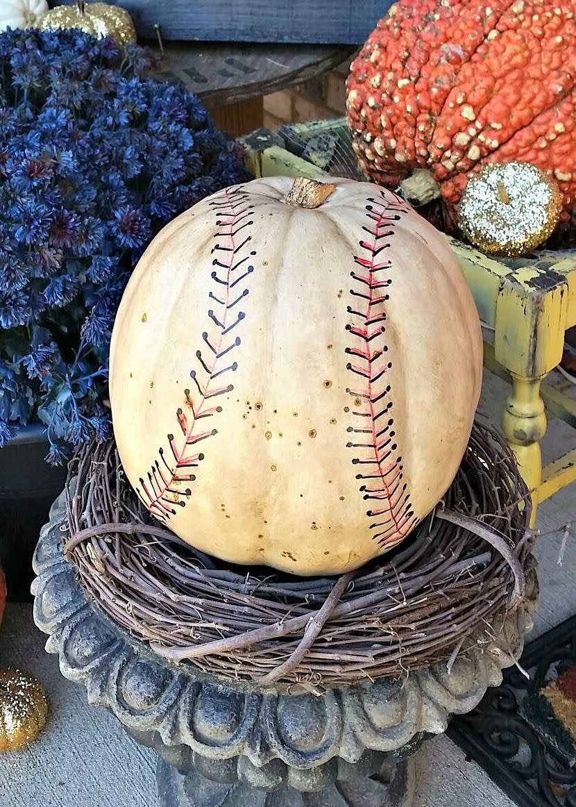 <p>Have a favorite sport? Turn your pumpkin into anything from a baseball to a soccer ball to a volley ball.</p><p>Get the tutorial at <a href="https://jenniferallwoodhome.com/baseball-pumpkin/" rel="nofollow noopener" target="_blank" data-ylk="slk:Jennifer Allwood Home;elm:context_link;itc:0;sec:content-canvas" class="link ">Jennifer Allwood Home</a>.</p>