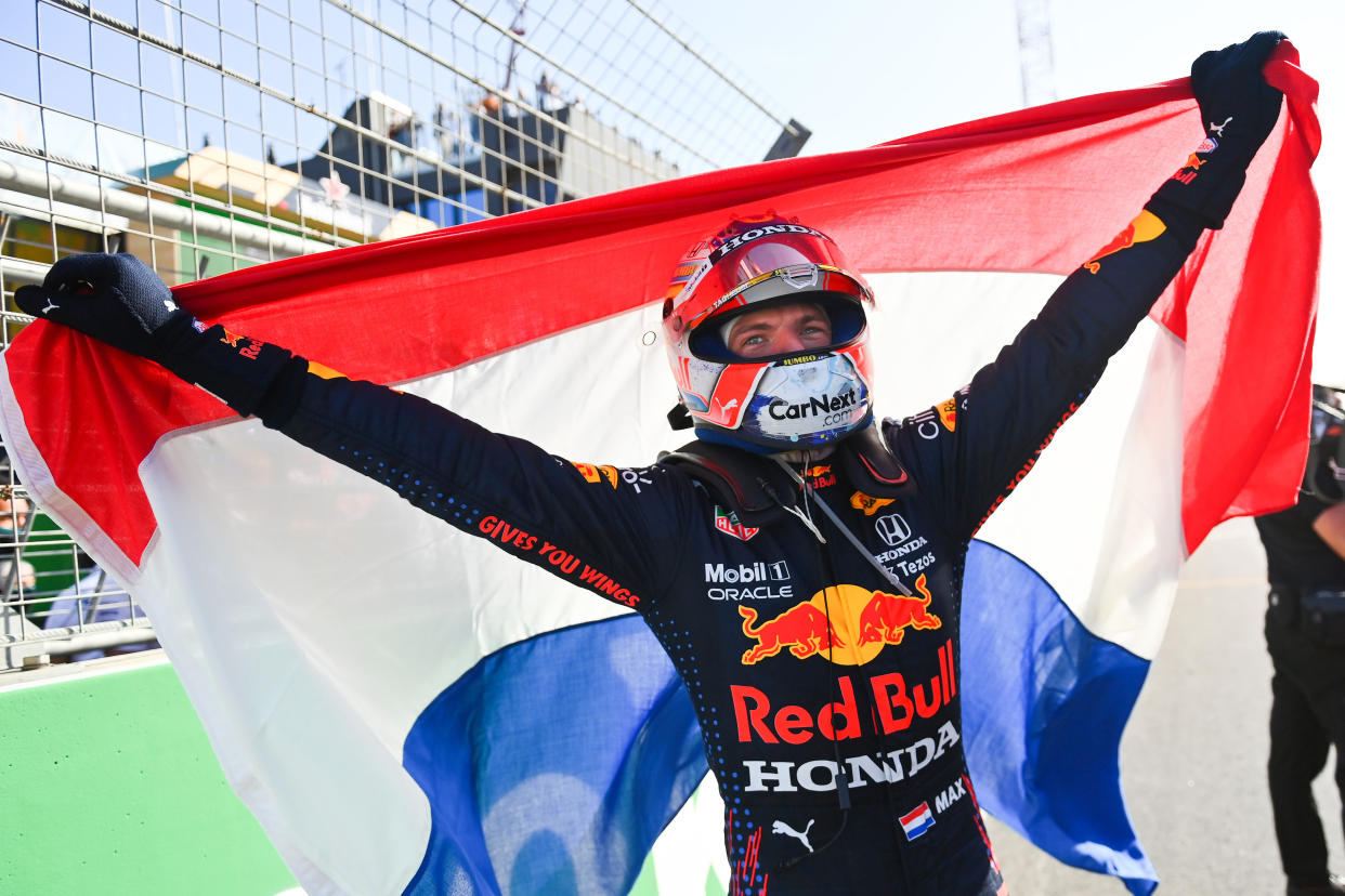 Race winner Max Verstappen celebrates.