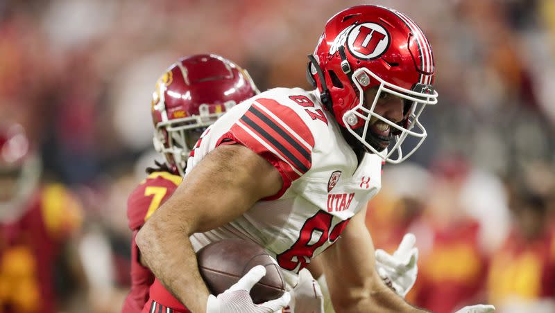 Utah Utes’ Thomas Yassmin runs the ball for a touchdown while playing the USC Trojans in the Pac-12 championship at the Allegiant Stadium in Las Vegas on Friday, Dec. 2, 2022. The Utes won 47-24.