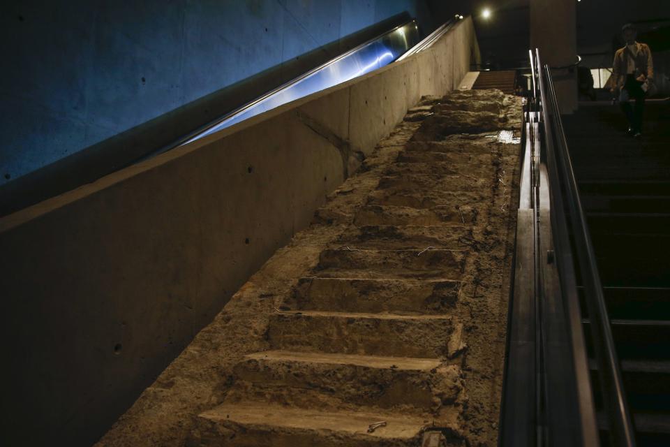 The 'Survivors' Stairs' are seen in the National September 11 Memorial & Museum during a media preview in New York May 14, 2014. A museum commemorating the Sept. 11, 2001 attacks on New York and Washington is on the verge of opening, with wrenchingly familiar sights as well as artifacts never before on public display. Among the first visitors to the National September 11 Memorial Museum are victims' family members and others intimately involved in its creation who will attend on Thursday, after a Wednesday media preview. The doors open to the general public on May 21. (REUTERS/Shannon Stapleton)