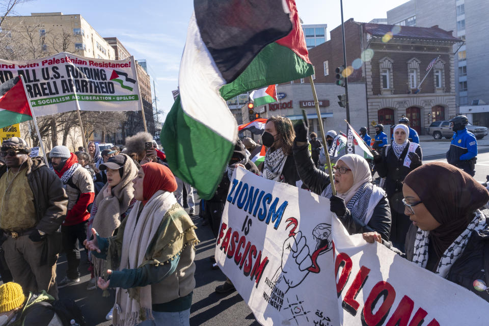 Pro-Palestinian protesters block the intersection of E St NW at New Jersey Ave. NW, near the Capitol, Thursday, Feb. 1, 2024, in Washington. (AP Photo/Jacquelyn Martin)