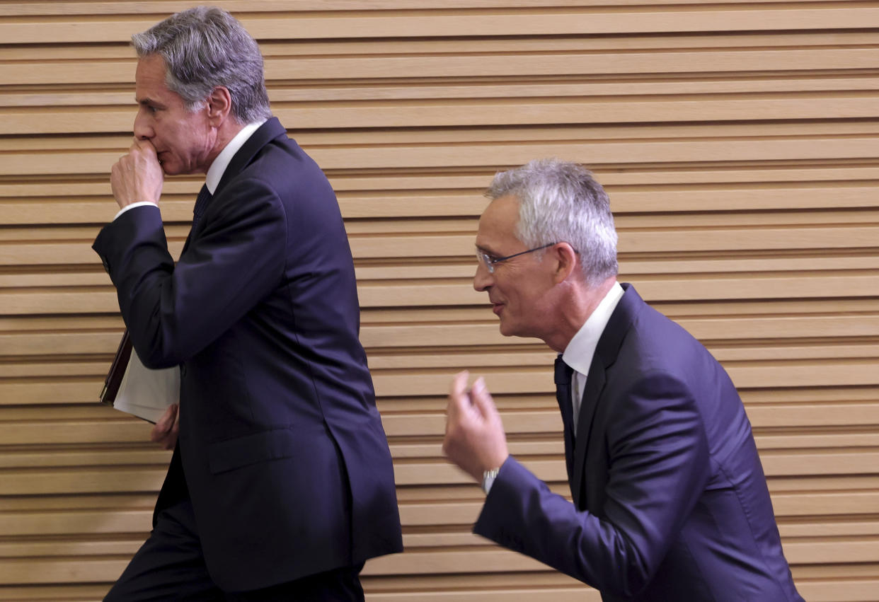 US Secretary of State Antony Blinken, left, and NATO Secretary General Jens Stoltenberg leave the room at the end of a media conference at NATO headquarters in Brussels, Friday, Sept. 9, 2022. (AP Photo/Olivier Matthys)
