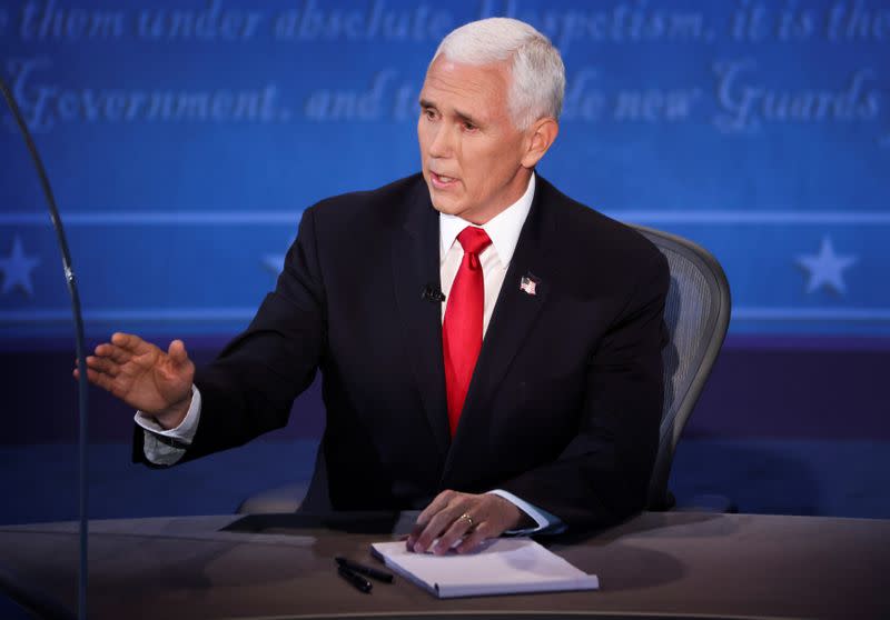 Democratic vice presidential nominee Senator Kamala Harris and U.S. Vice President Mike Pence participate in their 2020 vice presidential campaign debate in Salt Lake City