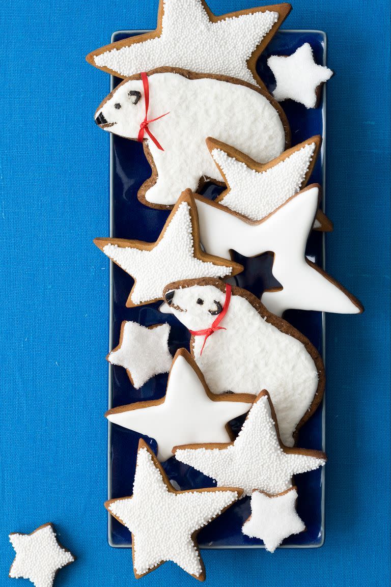 <p>Top off these easy-to-make polar bear and star-shaped gingerbread cookies with snowy white icing to add the perfect finishing touch to your Christmas dessert. </p><p><em><a href="https://www.womansday.com/food-recipes/food-drinks/recipes/a10856/gingerbread-polar-bears-frosted-stars-122233/" rel="nofollow noopener" target="_blank" data-ylk="slk:Get the recipe;elm:context_link;itc:0;sec:content-canvas" class="link ">Get the recipe</a>.</em></p>