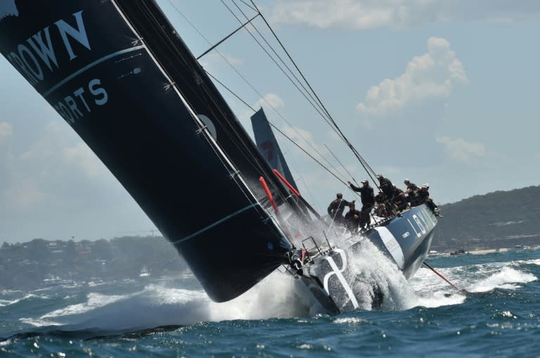 Australian supermaxi yacht Perpetual Loyal sails through Sydney Harbour at the start of the Sydney to Hobart yacht race on December 26, 2016