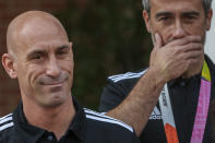 FILE - President of Spain's soccer federation, Luis Rubiales, left, stands next to Spain Head Coach Jorge Vilda after their World Cup victory at La Moncloa Palace in Madrid, Spain, Tuesday, Aug. 22, 2023. (AP Photo/Manu Fernandez, File)