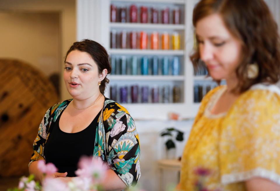 Sydnie Meyers (left), owner of Dreamy & Darling Creations, and Cherrelle Hitchcock, owner of Flora & Forge Farm, talk about opening up a new store together called Serendipity, located at 215 W. Commercial St., on Wednesday, June 7, 2023.