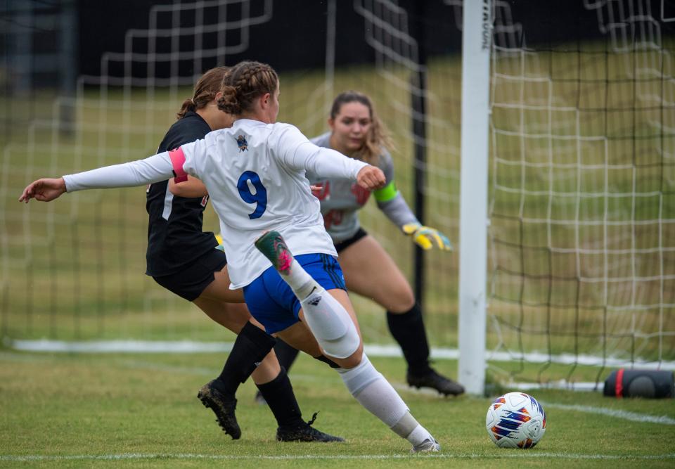 Castle’s Aleyna Quinn (9) takes a shot as the Castle Knights play the Harrison Warriors during the IHSAA Girls Soccer sectionals in Newburgh, Ind., Thursday, Oct. 5, 2023.