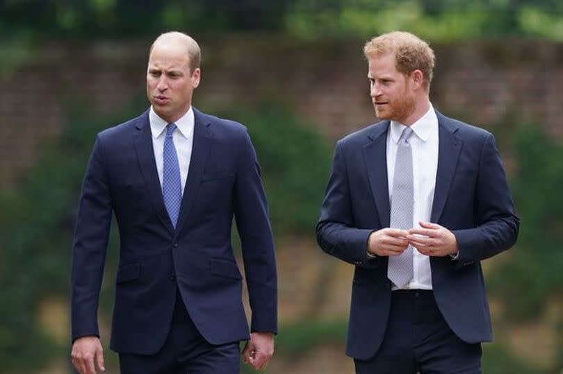 Prince William, Duke of Cambridge (left) and Prince Harry, Duke of Sussex arrive for the unveiling of a statue