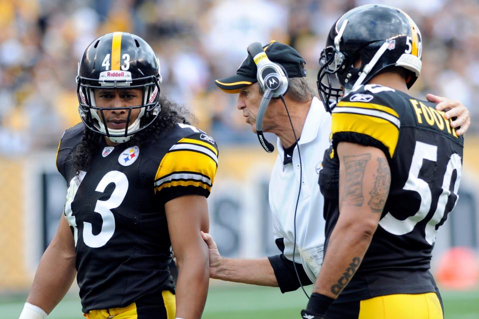 Steelers defensive coordinator Dick LeBeau talks with Troy Polamalu (43) and Larry Foote (50) during a timeout in the second quarter against the Atlanta Falcons in Pittsburgh, Sunday, Sept. 12, 2010. The Steelers won 15-9 in overtime.