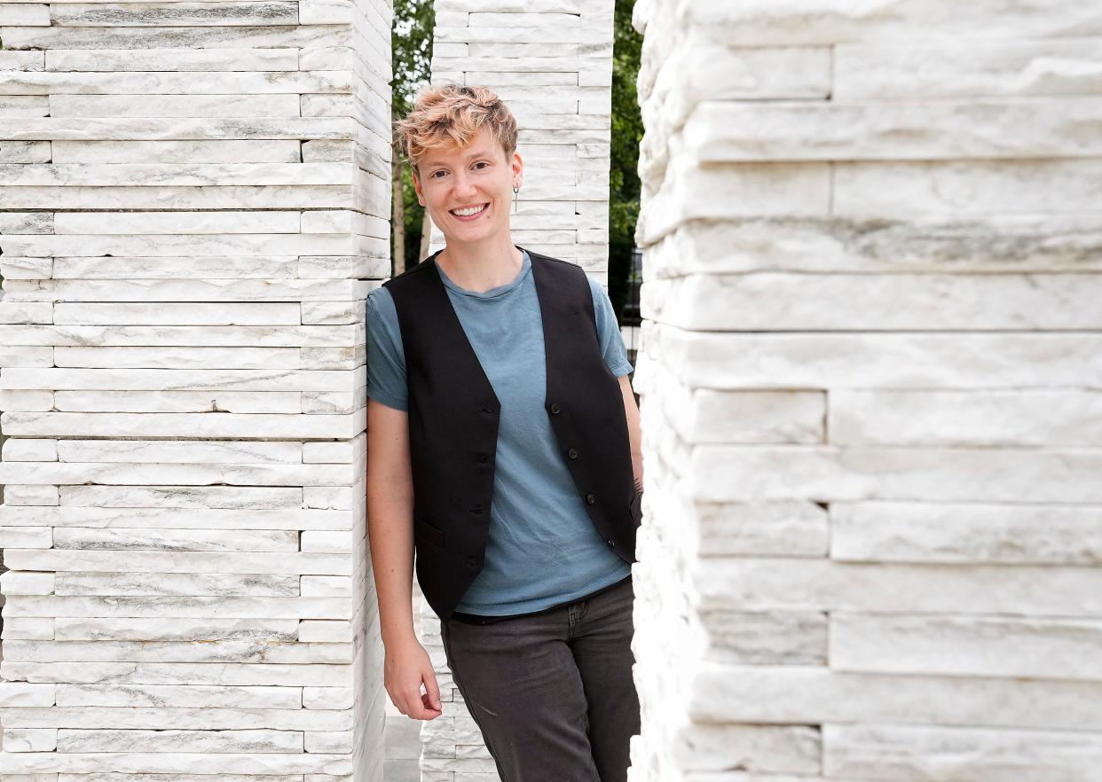 Laurenzo De Camilla (they/them), posing for a photo June 10 near the Columbus Metropolitan Library Main Branch, is a content creator, activist and founder of Laurenzo Community, an online community for LGBTQ+ youth.