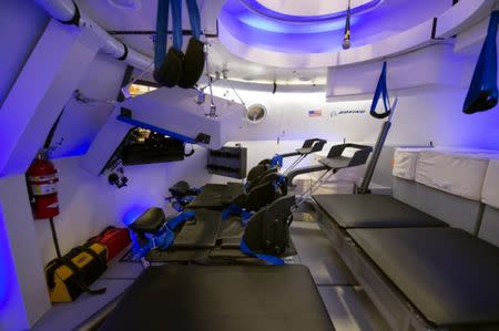 An interior view of Boeing's CST-100 spacecraft, which features LED lighting and tablet technology, in an undated NASA image. REUTERS/NASA/Robert Markowitz