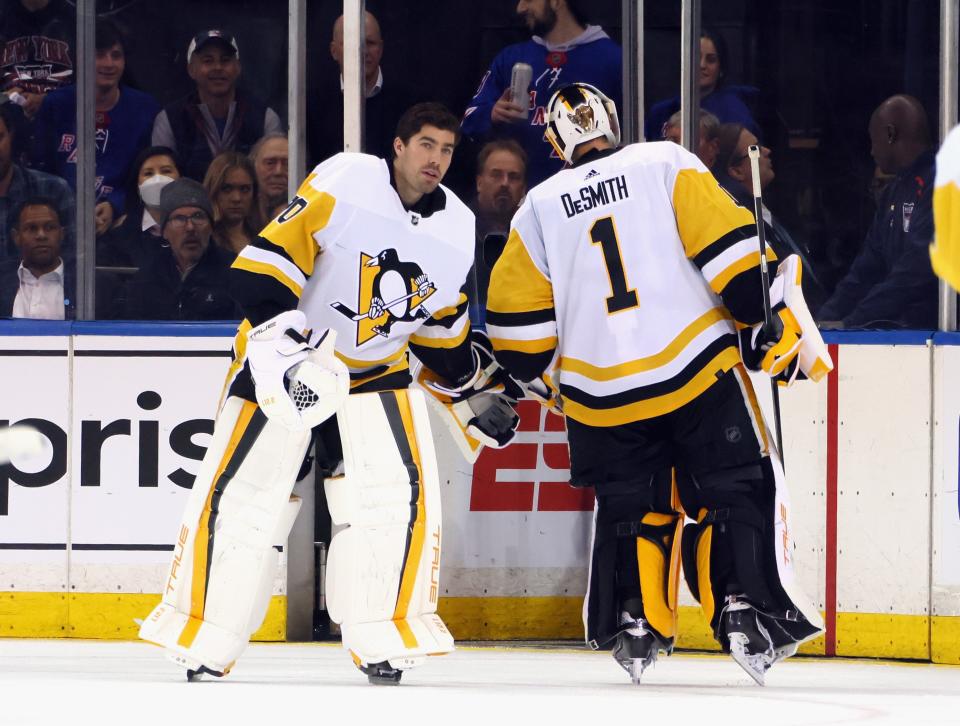 Louis Domingue, left, comes in during the second overtime period to take over goaltending duties from the Pittsburgh Penguins' Casey DeSmith.