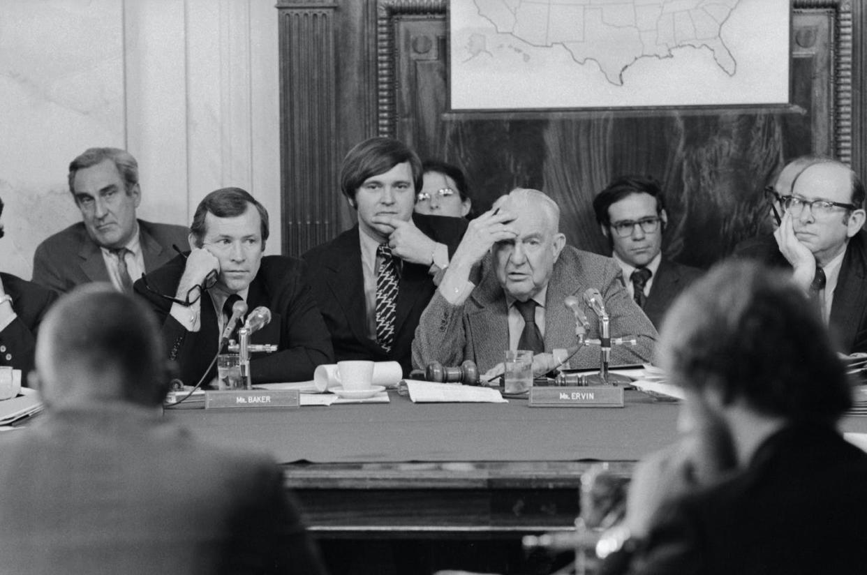 <span class="caption">Chairman of the Senate Watergate Committee Sam Ervin sits with Chief Counsel Sam Dash, Sen. Howard Baker, staffer Rufus Edmiston and others as they listen to a witness during the Watergate hearings. </span> <span class="attribution"><a class="link " href="https://www.gettyimages.com/detail/news-photo/chairman-of-the-senate-watergate-committee-sam-ervin-sits-news-photo/576823048?adppopup=true" rel="nofollow noopener" target="_blank" data-ylk="slk:Wally McNamee/CORBIS/Corbis via Getty Images;elm:context_link;itc:0;sec:content-canvas">Wally McNamee/CORBIS/Corbis via Getty Images</a></span>