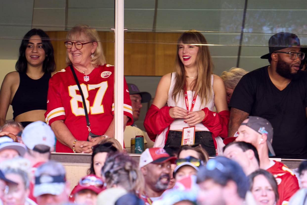 KANSAS CITY, MO - SEPTEMBER 24: Taylor Swift cheers from a suite with Donna Kelce as the Kansas City Chiefs play the Chicago Bears during the first half at GEHA Field at Arrowhead Stadium on September 24, 2023 in Kansas City, Missouri. (Photo by Cooper Neill/Getty Images)