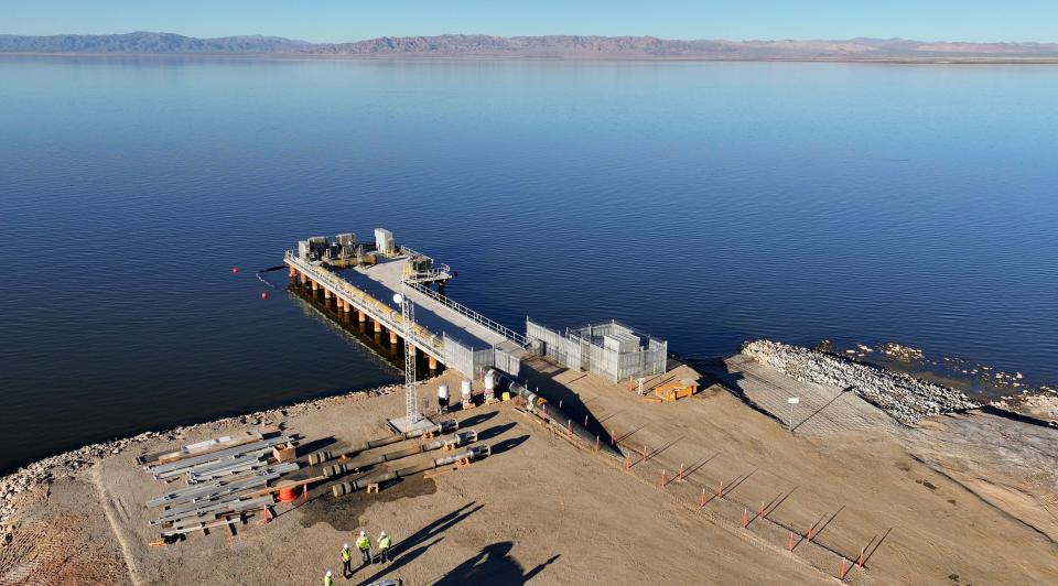 A pump station and pipeline are pictured at the end of a 1.25-mile-long causeway, that will pump water from the Salton Sea into ponds for the Species Conservation Habitat Project in Imperial County, Calif., on Wednesday, Dec. 13, 2023. The Species Conservation Habitat Project will turn over 4,000 acres of exposed lake bed into wetlands habitat for aquatic wildlife and migratory birds of the Pacific Flyway, as part of a 10-year plan to restore 30,000 acres around the Salton Sea. | Kristin Murphy, Deseret News