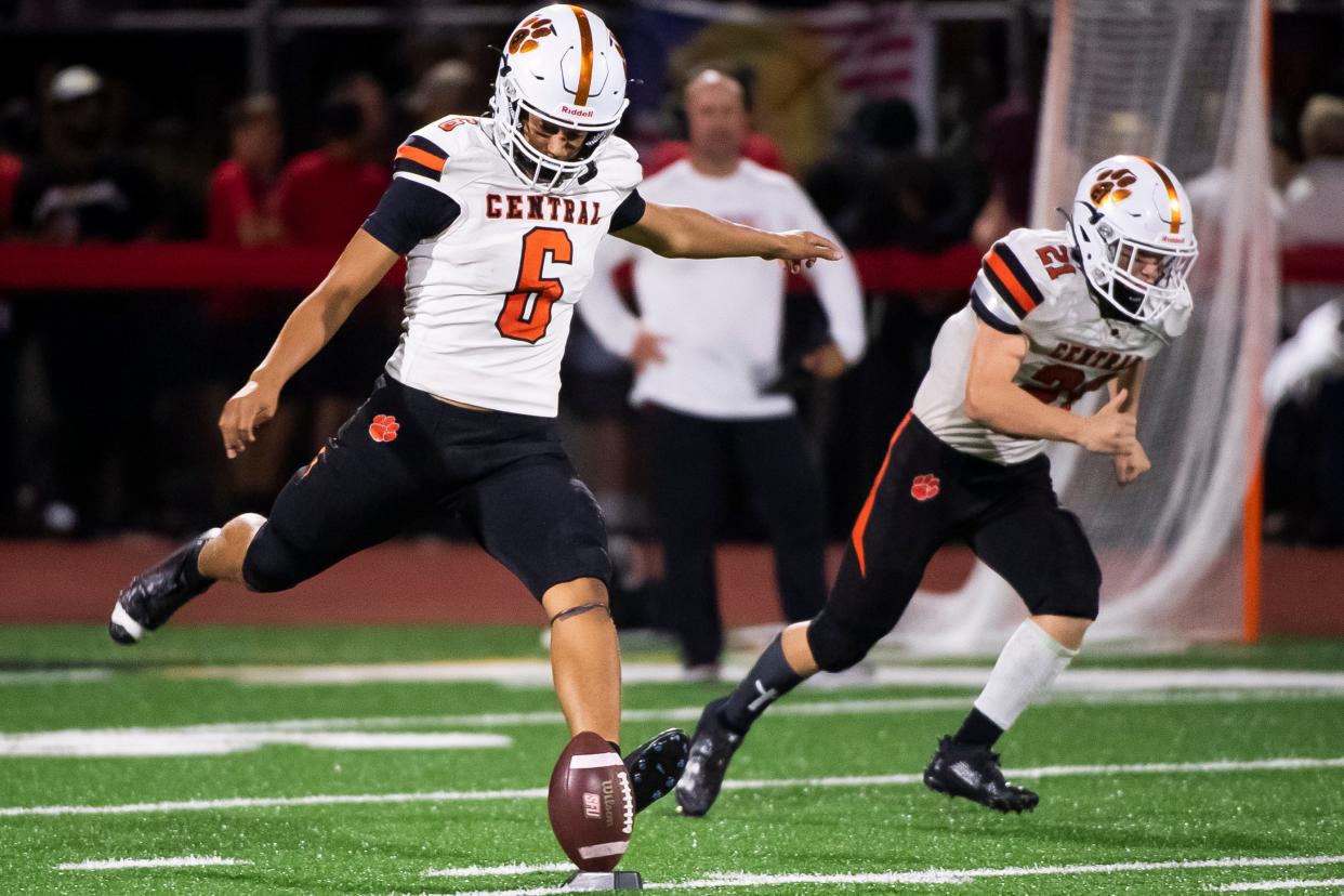 Central York's Matthew Parker boots a kick, resulting in a touchback, during a non-conference football game against Cumberland Valley at Chapman Field August 26, 2023 in Mechanicsburg. The senior kicking specialist also handles punts, PATs and field goals for the Panthers.