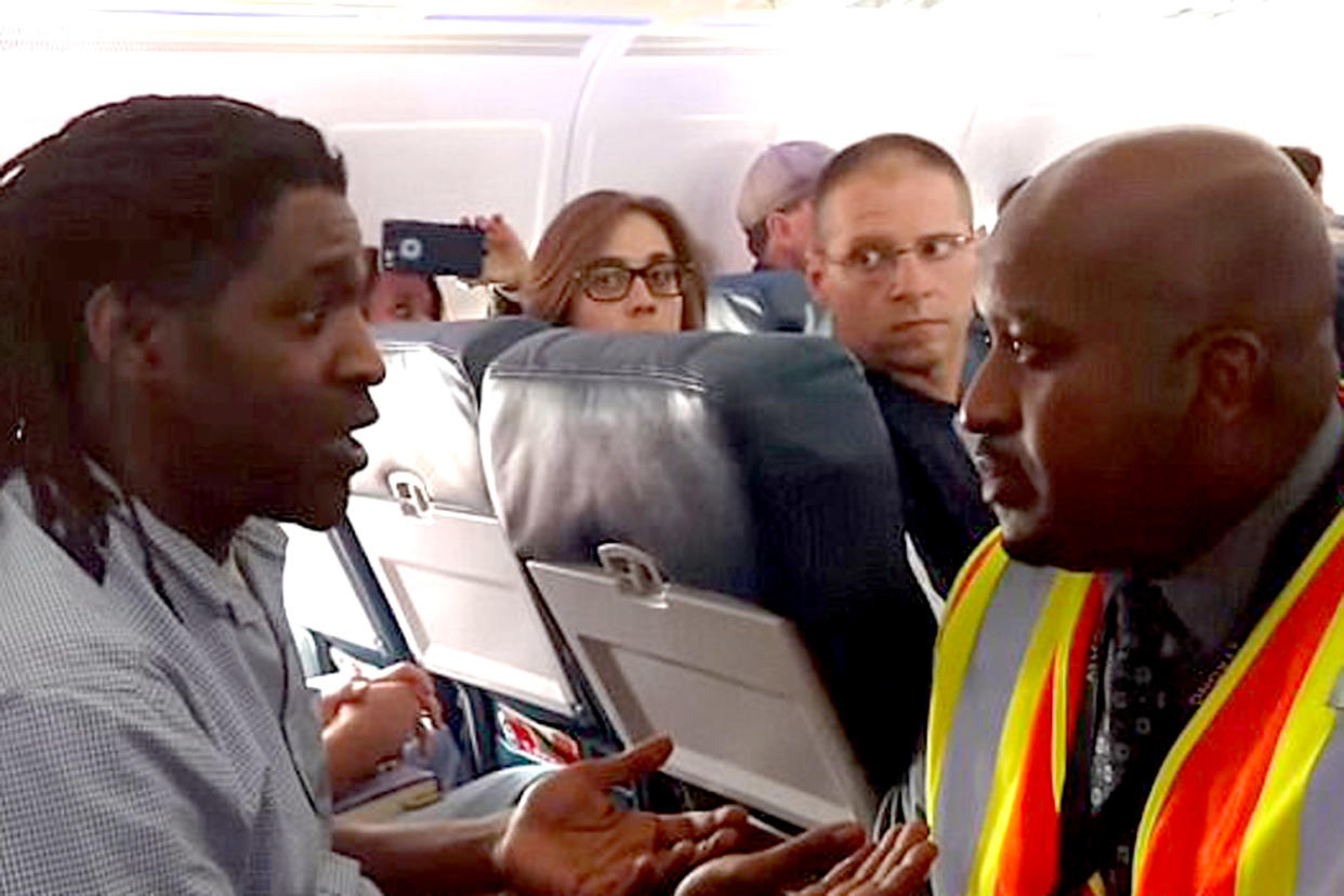 Kicked off: Kima Hamilton was shocked when Delta asked him to get off the plane: Kay GLR/YouTube