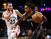 Dec 7, 2018; Brooklyn, NY, USA; Brooklyn Nets guard D'Angelo Russell (1) drives to the basket against Toronto Raptors guard Fred VanVleet (23) during the second half at Barclays Center. Noah K. Murray-USA TODAY Sports