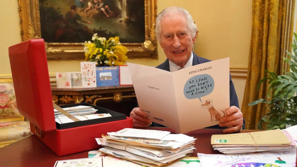 PHOTO: In this photo released on February 23, King Charles III reads cards and messages, sent by well-wishers following his cancer diagnosis, in the 18th Century Room of the Belgian Suite at Buckingham Palace, Feb. 21, 2024, in London, England.  (Jonathan Brady/Pool via Getty Images)