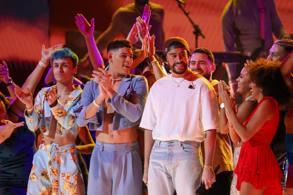 bad bunny on stage with dancers