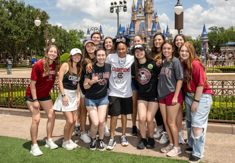 (April 27, 2024) South Carolina women’s basketball head coach Dawn Staley greets several Walt Disney World Resort cast members wearing South Carolina apparel on Saturday afternoon. Staley and her assistant coaches were at Walt Disney World to celebrate the team’s recent national championship. (Kent Phillips, photographer)