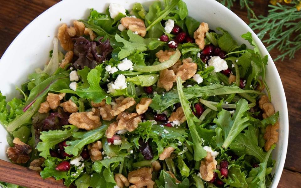 <p>Callie Blount</p><p>Studded with pomegranate arils and walnuts, this recipe transforms store-bought salad mix into a company-worthy companion for holiday entrees. The easy homemade vinaigrette perfectly balances the oil-vinegar with rosemary, thyme and garlic. Feta cheese adds the finishing touch!</p><p><strong>Get the recipe: <a href="https://parade.com/1100562/parade/holiday-greens-salad-recipe/" rel="nofollow noopener" target="_blank" data-ylk="slk:Holiday Greens Salad;elm:context_link;itc:0;sec:content-canvas" class="link ">Holiday Greens Salad</a></strong></p>