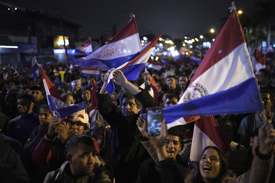 Supporters of National Crusade Party presidential candidate, Paraguayo Cubas, protest outside the Electoral Tribunal building, in Asuncion, Paraguay, Friday, May 5, 2023. Police on Friday detained Cubas, a far-right populist who came in third in Sunday’s presidential election and had alleged without evidence the vote was marred by fraud. (AP Photo/Jorge Saenz)