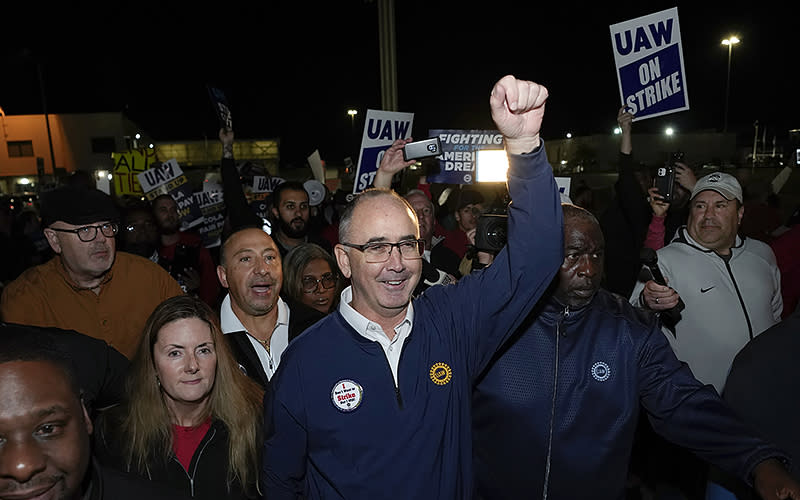 United Auto Workers President Shawn Fain walks with union members striking Sept. 15 at Ford’s Michigan Assembly Plant in Wayne. <em>Associated Press/Paul Sancya</em>