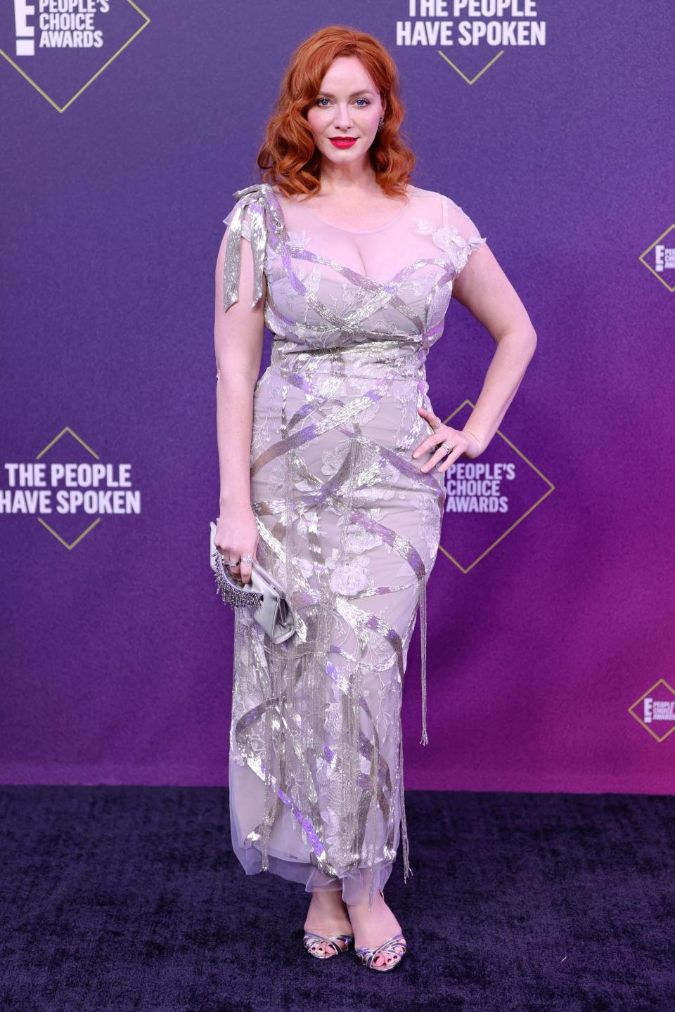 <h2>Christina Hendricks in Marchesa<br></h2><br><em>Mad Men</em> star Christina Hendricks paired her Old Hollywood-esque curls and red lip with a sparkling silver dress by Marchesa. <br><br><span class="copyright">Photo: Rich Polk/E! Entertainment/NBCU Photo Bank via Getty Images</span>