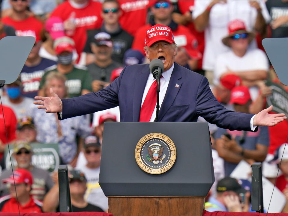 <p>President Donald Trump gestures during a campaign rally Thursday, 29 October 2020, in Tampa, Florida</p> ((Associated Press))