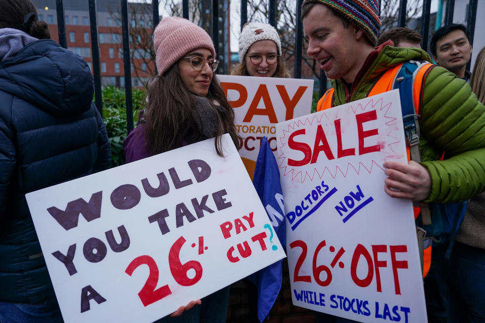 NEWCASTLE UPON TYNE, ENGLAND - JANUARY 3: Junior doctors take part in a picket line outside the Royal Victoria Infirmary in Newcastle, at the start of a six-day strike on January 3, 2024 in Newcastle upon Tyne, England. The junior doctors' strike, which is due to last until 7am on Tuesday, January 9, is the longest consecutive strike in NHS history. It follows a three-day industrial action in December 2023 sparked by an ongoing pay dispute with the government. (Photo by Ian Forsyth/Getty Images)