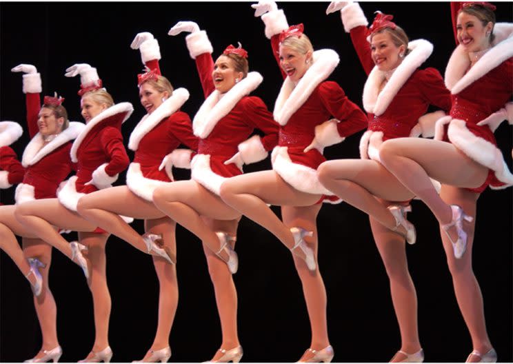 Members of the Radio City Rockettes wear their Christmas costumes. (Photo: AP)