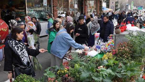 PHOTO: Iranian women shop at the Tajrish Bazaar, ahead of Nowruz, the Iranian New Year, in Tehran, Iran March 15, 2023. (Wana News Agency via Reuters)