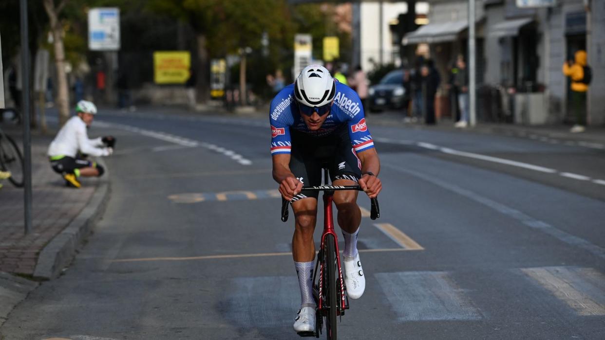 team alpecin's mathieu van der poel rides in the last kilometer on his way to win the milan sanremo one day classic cycling race on march 18, 2023