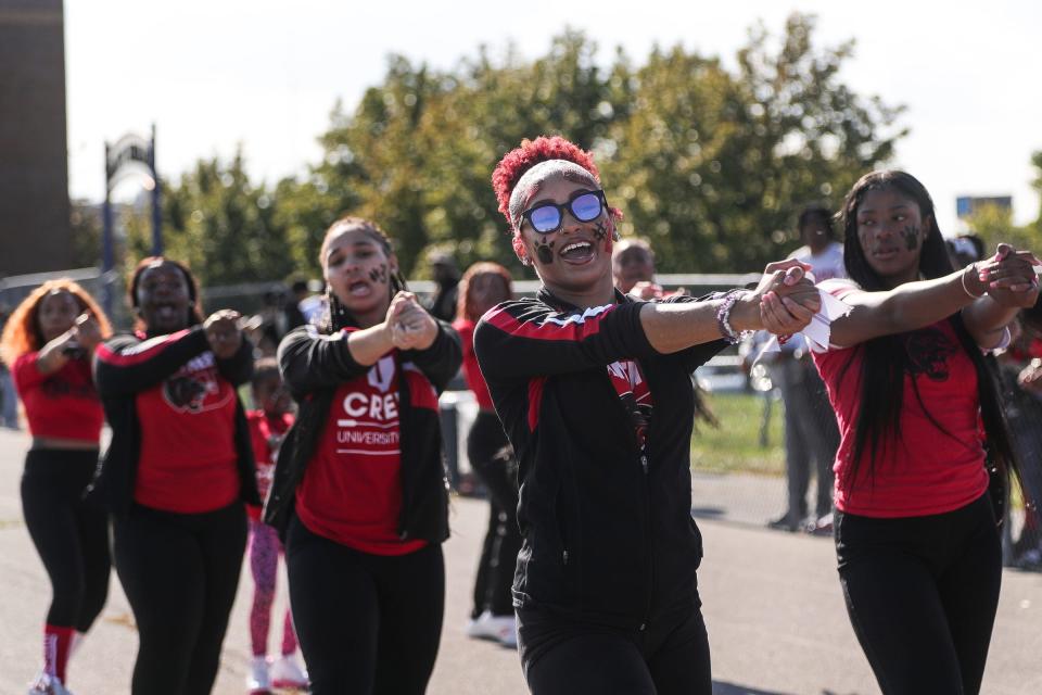 Senior Da'Kaylah Napier cheers on the sideline with her teammates during a football game between University Prep Academy and University Prep Science and Math at Plymouth Education Center in Detroit on Sept. 14, 2023. In addition to cheerleading, Napier runs track and is in the National Honor Society, President of the Student Council, and a member of Grand Valley State University TRIO Upward Bound Detroit. She says, "I think that all of the extracurricular activities and programs I'm involved in will play a big role in helping me stand out to colleges as it shows that I'm a very involved student in my school dynamic. It also helps to illustrate the fact that I can be an athlete and leader in various environments while still maintaining good academics." In an increasingly selective admissions environment, experts on getting into college say extracurricular activities are an important part of getting noticed by admissions committees. Students who take leadership roles in their clubs or organizations, who go outside of school walls to engage with the community, or who can show outcomes from their involvement in causes or clubs will stand out.