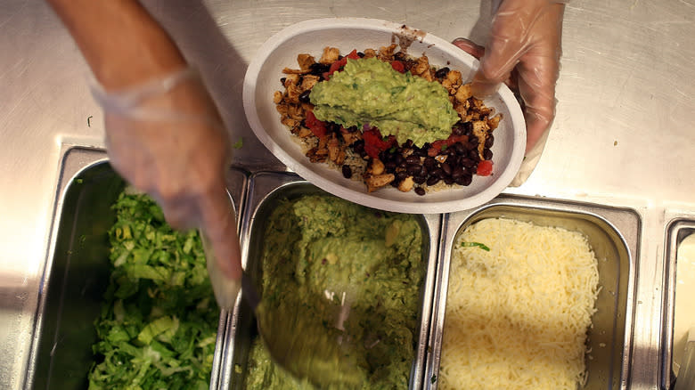 burrito bowl being assembled