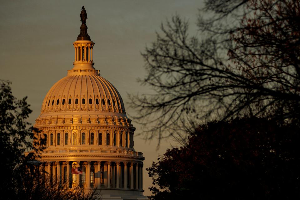 The rising sun strikes the US Capitol dome on Nov. 8, 2022, in Washington. After months of campaigning, Americans across the nation are heading to the polls to cast their votes in the midterm elections.