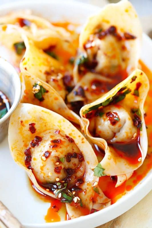 <p>Rasa Malaysia</p><p>Delicious and mouth-watering wontons in red oil and black vinegar sauce. Easy recipe for homemade spicy wontons for dinner today.</p><p><strong>Get the recipe: <a href="https://rasamalaysia.com/sichuan-red-oil-wontons-recipe/" rel="nofollow noopener" target="_blank" data-ylk="slk:Sichuan Red Oil Wantons;elm:context_link;itc:0;sec:content-canvas" class="link "><em>Sichuan Red Oil Wantons</em></a></strong></p>