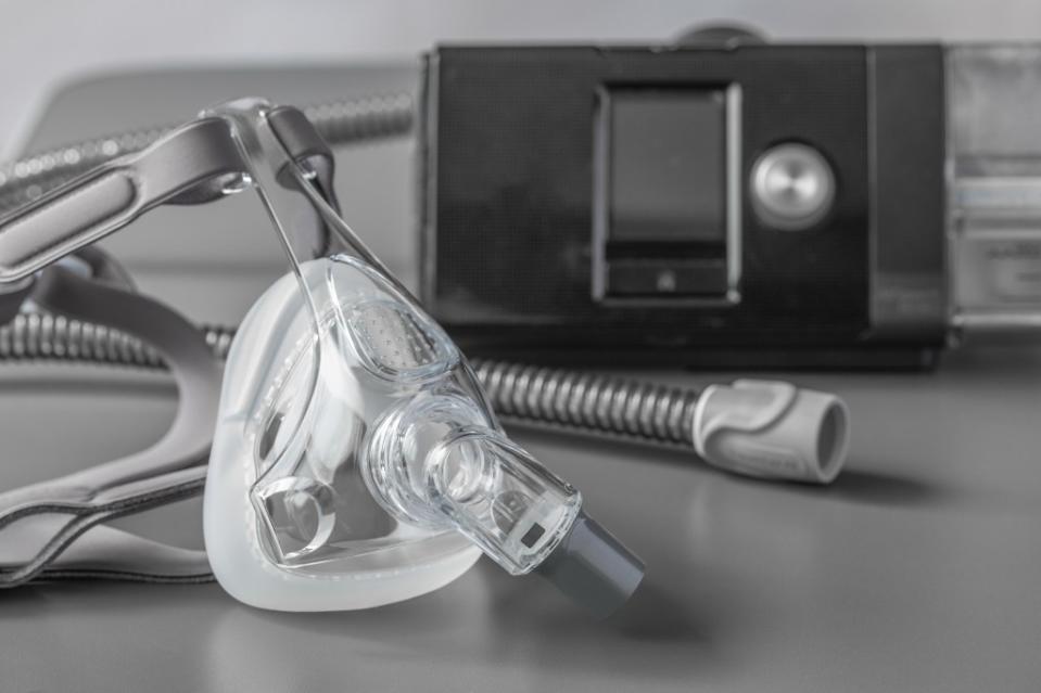 While effective, CPAP machines are both cumbersome and cost-prohibitive. sokko_natalia – stock.adobe.com